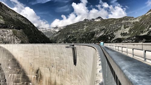 View of dam against cloudy sky