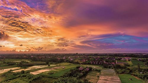 Scenic view of landscape against sky during sunset