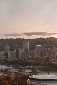 High angle view of buildings against sky during sunset