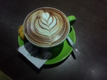 Close-up of coffee cup on table