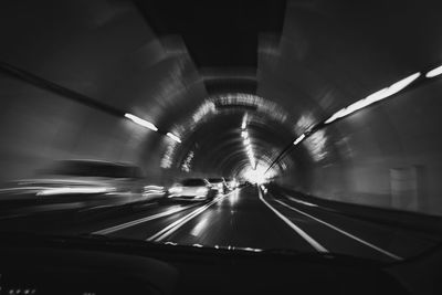 Blurred motion of car in tunnel