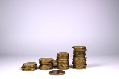 Stack of coins against white background