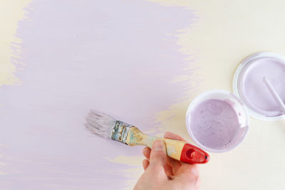 Midsection of woman holding drink