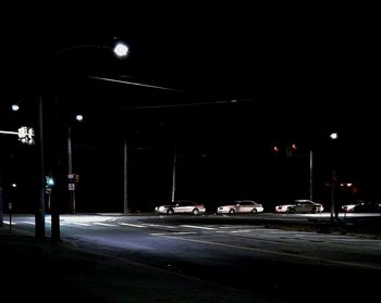 Illuminated street light at night