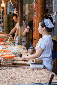 Midsection of woman working