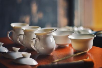 Close-up of a tea set on table