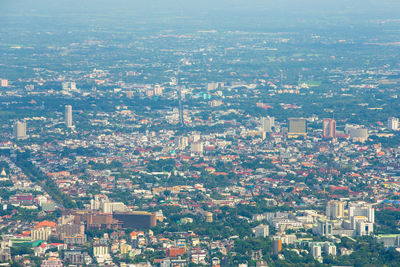 High angle view of illuminated buildings in city against sky