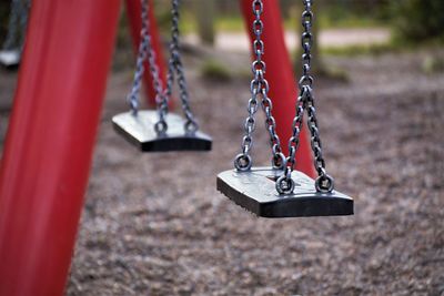 Close-up of swing at park