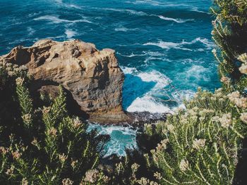 High angle view of rock formation in sea