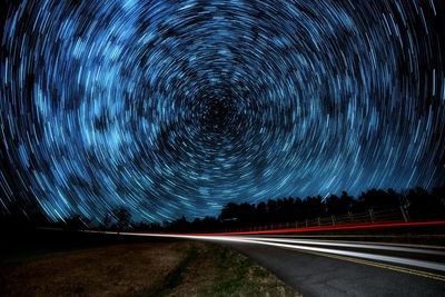 Full frame shot of light trails and star trails