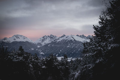 Scenic view of mountains against sky during winter