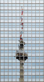 Low angle view of building reflection