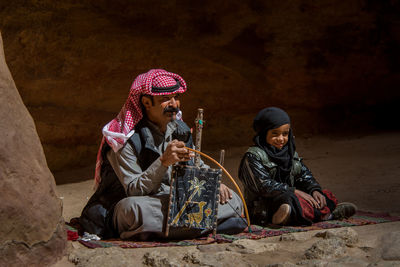 Women sitting on land