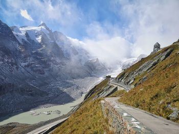 Scenic view of snowcapped mountains against sky