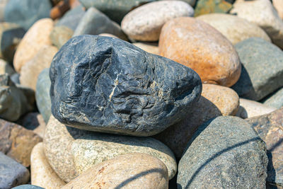 Beautiful river stones outdoors under the sun