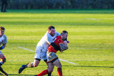 Group of people playing on field