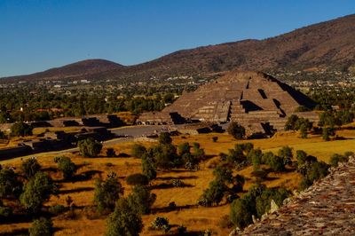 High angle view of old ruins against clear sky