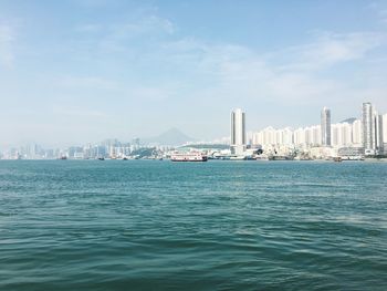 Sea with city in background