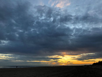 Scenic view of dramatic sky during sunset