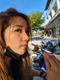 Close-up portrait of a beautiful young woman