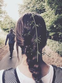 Rear view of woman with umbrella