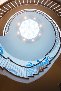Low angle view of stairs against dome ceiling