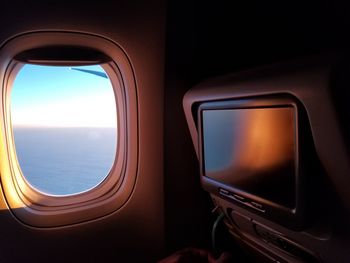 Low angle view of airplane window