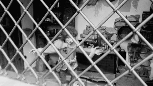 Close-up of chainlink fence in cage