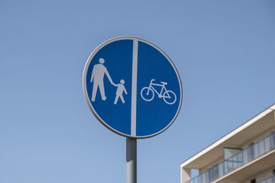 Cyclist and pedestrian route sharing sign. road sign pedestrian and bicycle can cross the street
