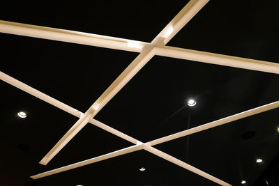 Low angle view of illuminated ceiling