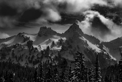 Scenic view of mountains against sky during winter