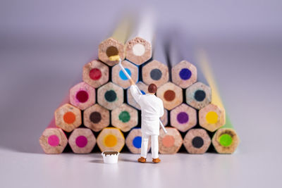 Close-up of multi colored pencils on table