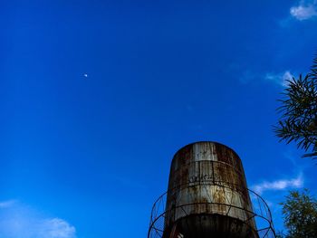 Low angle view of water tower against sky