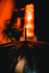 Close-up of wet umbrella at night