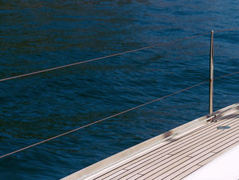 High angle view of boat sailing in sea
