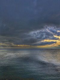 Scenic view of sunset over sea