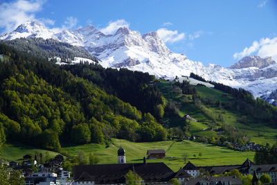 Scenic view of snowcapped mountains against sky