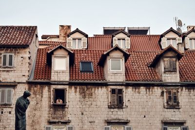 Low angle view of buildings in city against sky