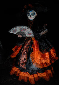 Full frame shot of halloween mask against black background