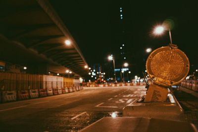 Close-up of illuminated lights at night