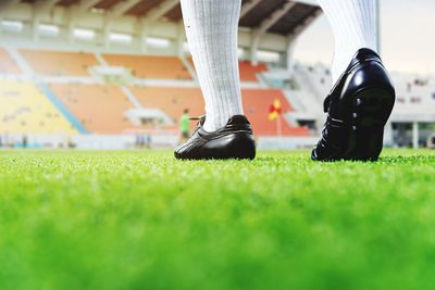 Low section of man on soccer field