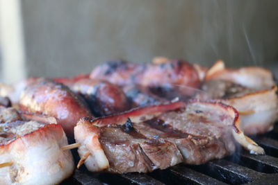 High angle view of meat being grilled on barbecue