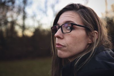 Portrait of young woman wearing glasses