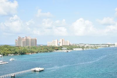 City skyline with sea in background