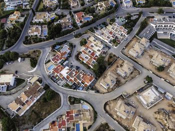 High angle view of street amidst buildings in city