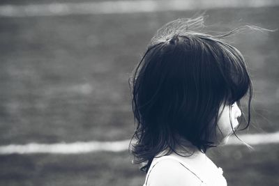 Close-up of girl with tousled hair