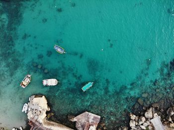 High angle view of rocks in sea