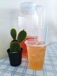 Glass of drink on table