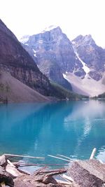 Scenic view of lake with mountains in background