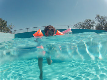 Swimming pool against blue sky